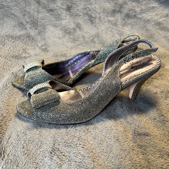 Worn once!  Silver sparkly heels with a bow - Picture 2 of 4